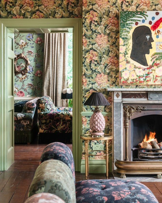 Castle India: a colourful and patterned living room with a doorway to a lounge
