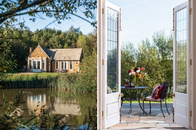 Luxury boathouse with pond views, French doors with bistro table positioned overlooking grounds