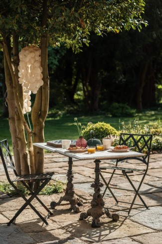 Sit awhile on the sunny patio