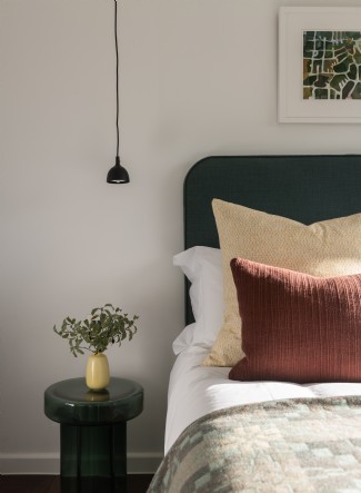 Each bedroom features crisp, white linens and interesting design details