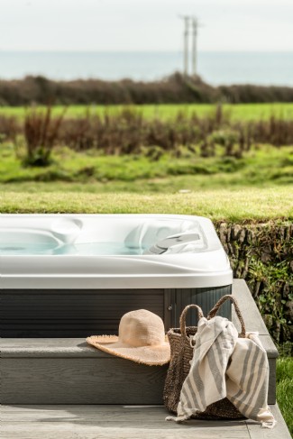A hot tub with a sea view