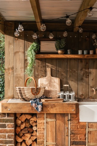 The outdoor kitchen is perfect for summer feast nights