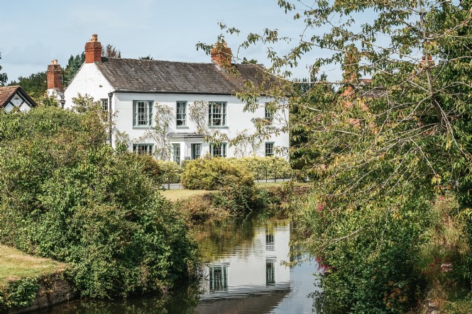The house holds fishing rights so guests can cast straight from the lawn