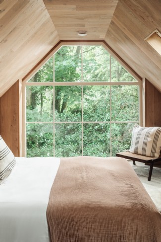 The bothy bedroom exudes a treehouse essence
