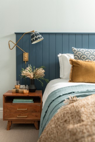 Inky blues feature in this ground floor bedroom