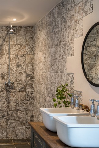 A twin shower takes centre-stage in the ground floor bathroom