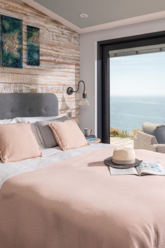 Enjoy lazy mornings in bed, waking to the sound of the ocean