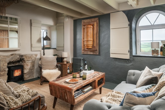 The sitting room on the second floor with an electric log effect fire