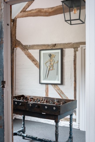 A vintage ´babby foot´ table invites competition in the games room