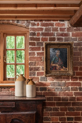 A traditional country theme runs throughout this West Sussex retreat